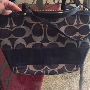 #6 Coach regular sized bag and wallet.